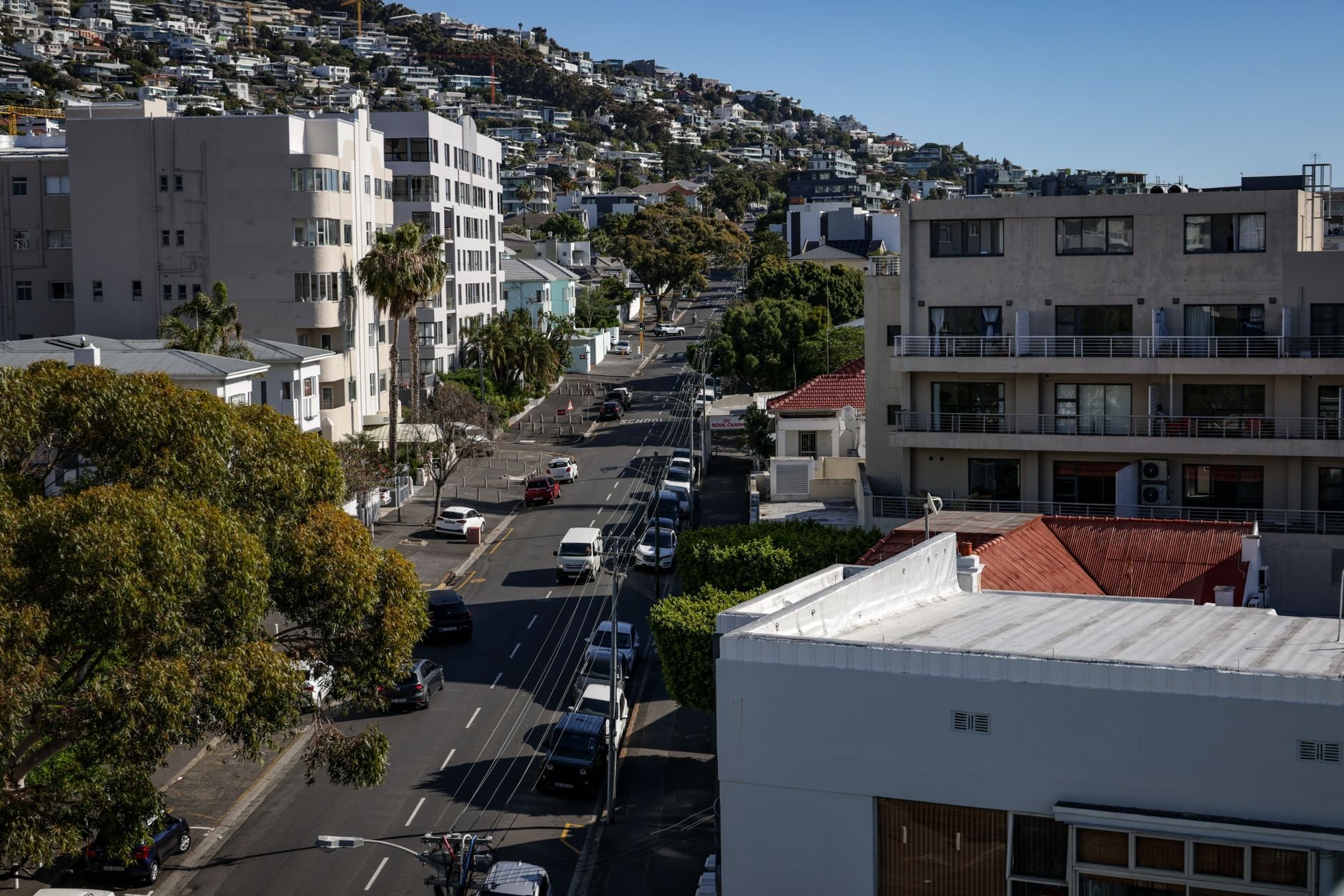 Aerial view of Cape Town's residential streets with modern architecture during daytime.